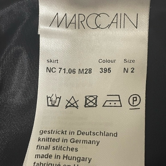 Marc Cain knit black knee length skirt with metallic silver side seams. - Picture 11 of 14